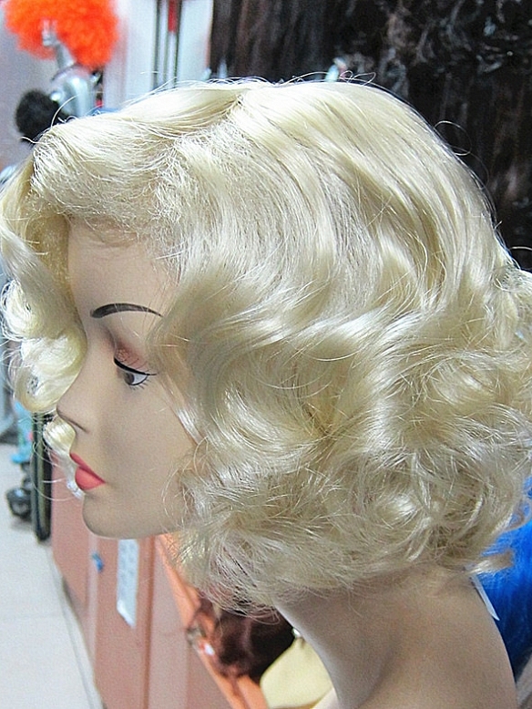 Funky new style blonde short wavy hair